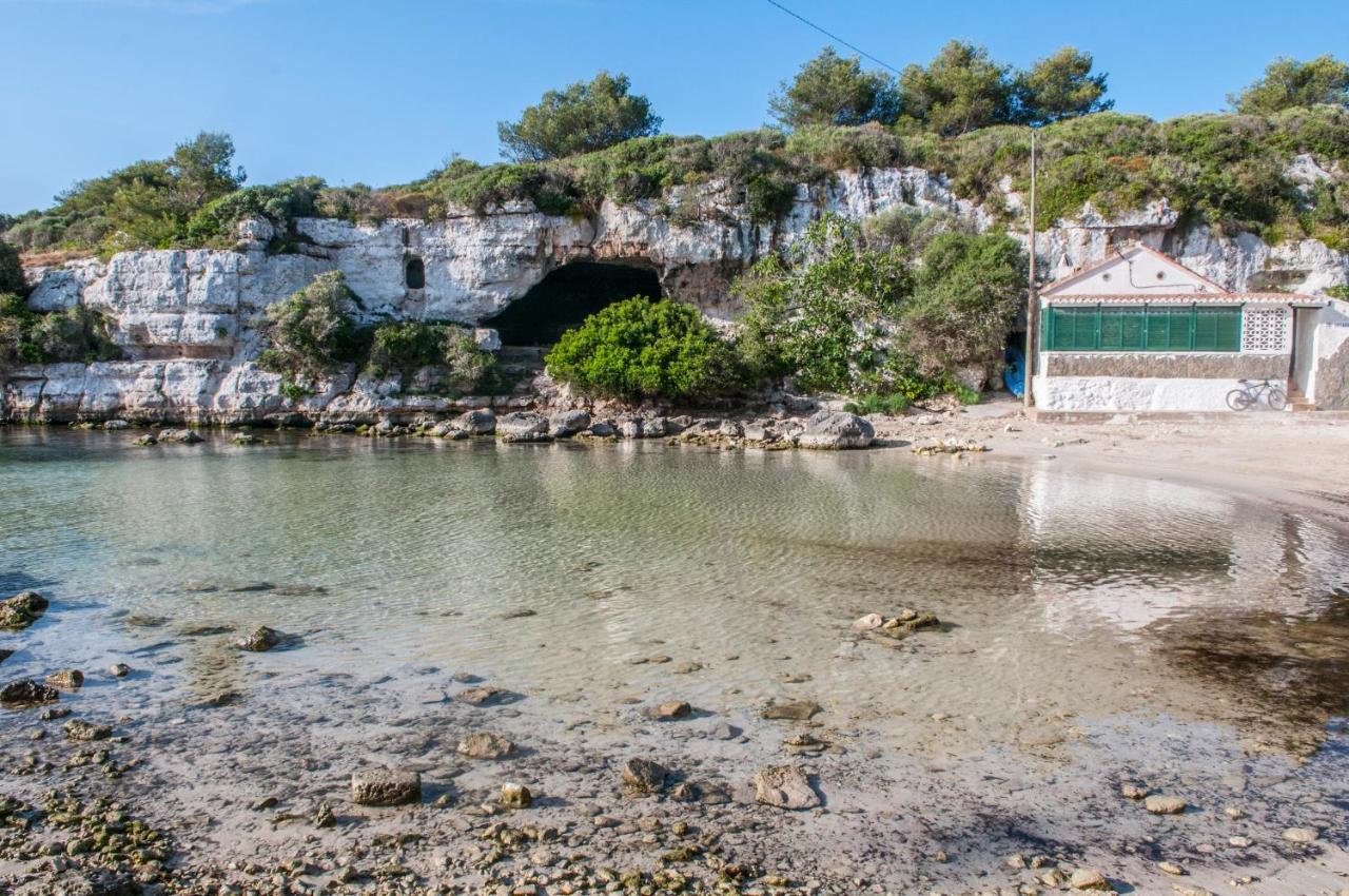 Hostal Xuroy Cala Alcaufar Bagian luar foto